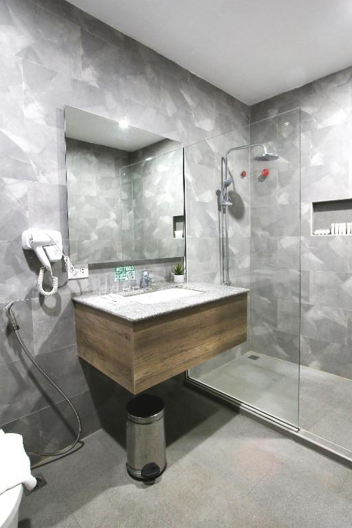 Koupelna v ubytování Carlosta Hotel