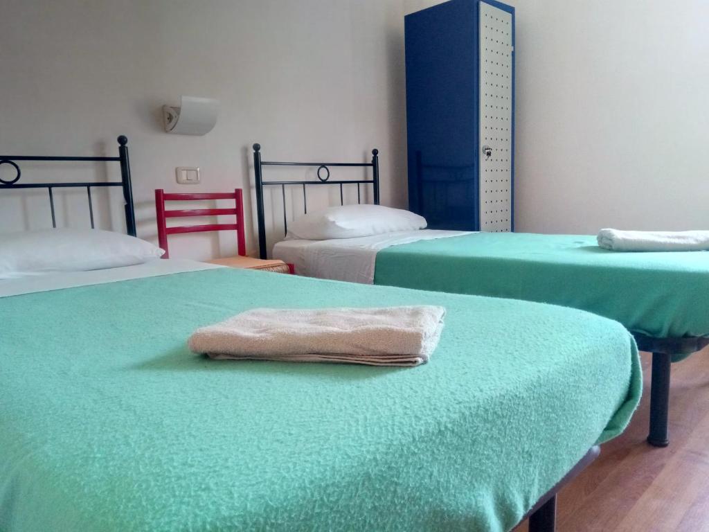 Letto o letti in una camera di Ex Latteria di Platischis