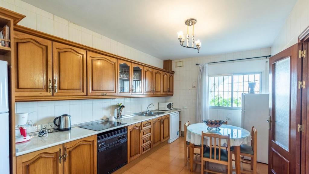 Kuchyň nebo kuchyňský kout v ubytování Casa Los Naranjos Canillas de Aceituno by Ruralidays