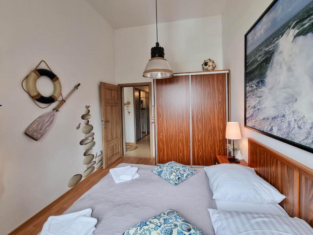 Posteľ alebo postele v izbe v ubytovaní visit baltic - Apartament MEWA
