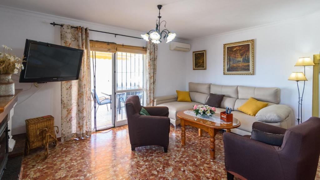 A seating area at Villa José Andrés Torrox by Ruralidays