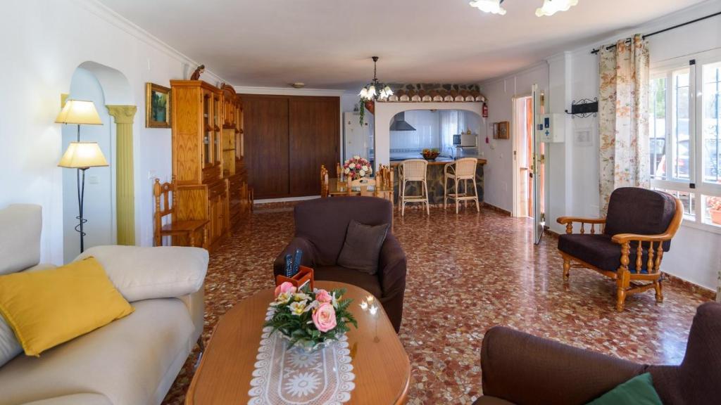 A seating area at Villa José Andrés Torrox by Ruralidays