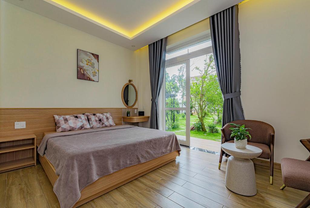 Giường trong phòng chung tại An Mai Boutique Hotel
