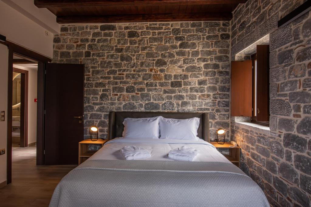 Postel nebo postele na pokoji v ubytování Manifest Boutique Hotel