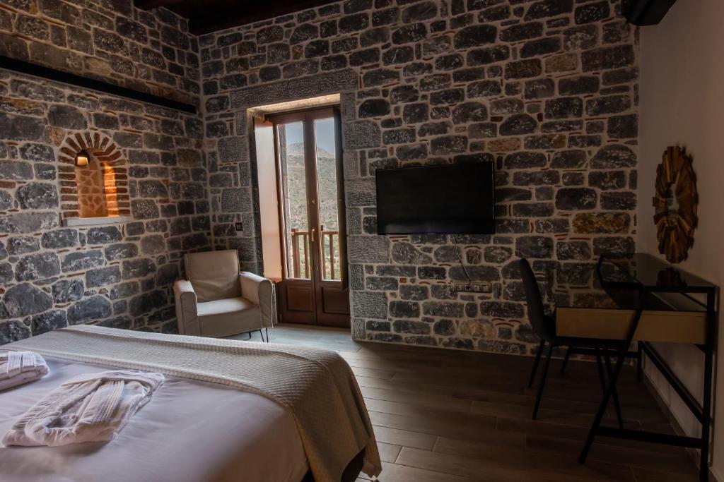 Postel nebo postele na pokoji v ubytování Manifest Boutique Hotel