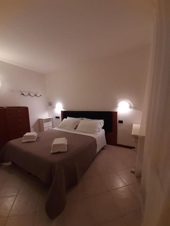 Postel nebo postele na pokoji v ubytování Casa di Clara