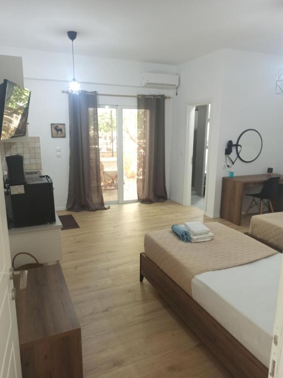 Uma cama ou camas num quarto em Bourbos Summer Rooms