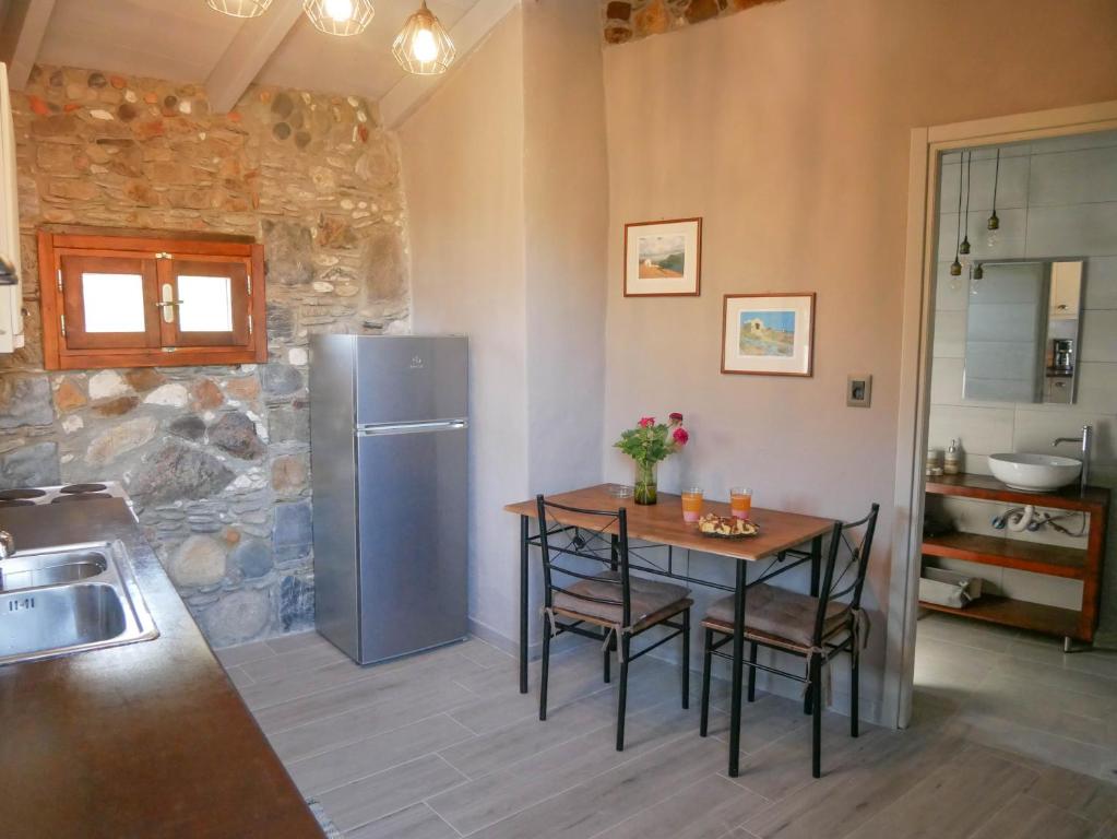 Kuchyň nebo kuchyňský kout v ubytování Velanos Villas