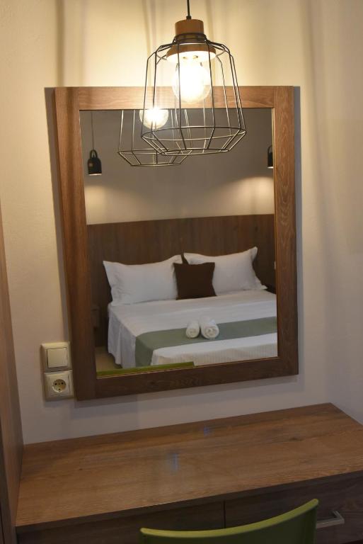 Postel nebo postele na pokoji v ubytování Shining Star Petra