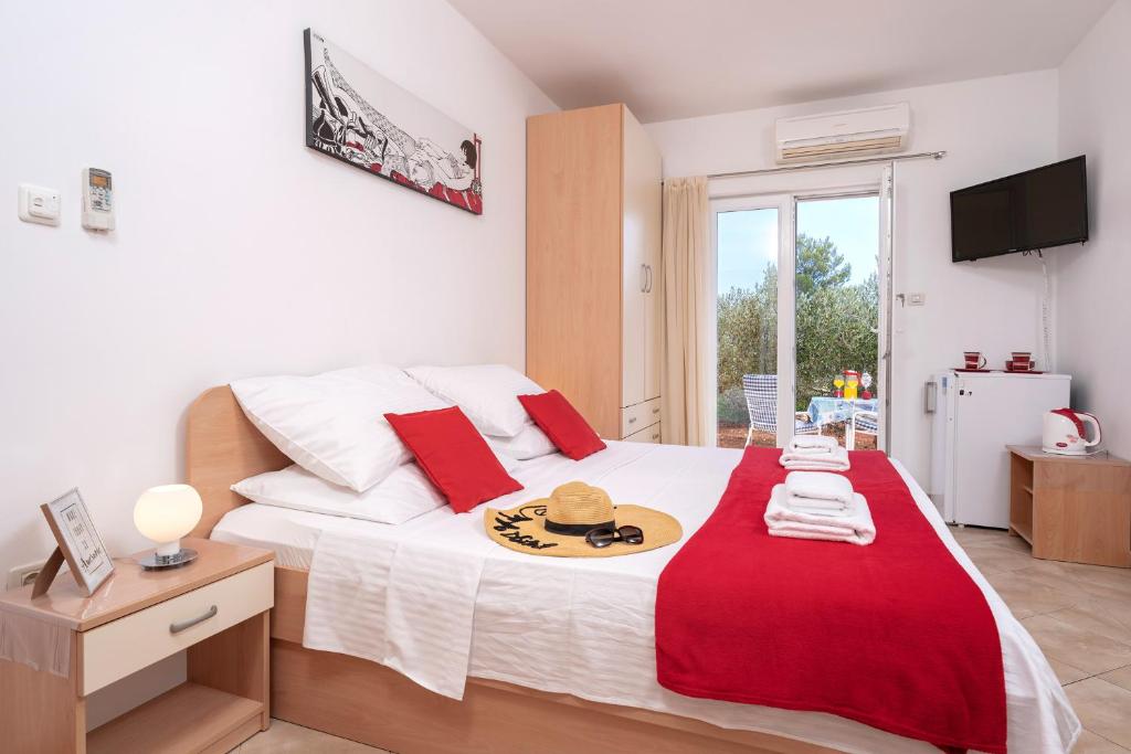 Postel nebo postele na pokoji v ubytování Villa Fio - Rooms & Studio