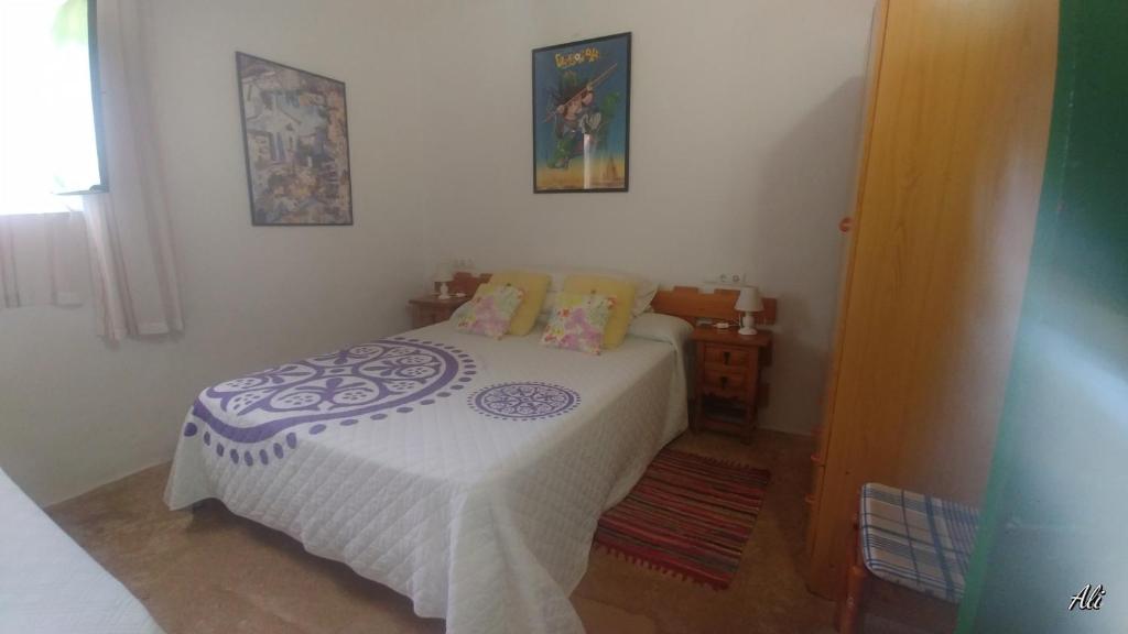Postel nebo postele na pokoji v ubytování Can Xumeu Miquel