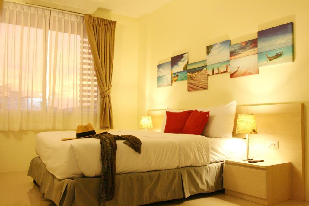 Postel nebo postele na pokoji v ubytování Apo Hotel