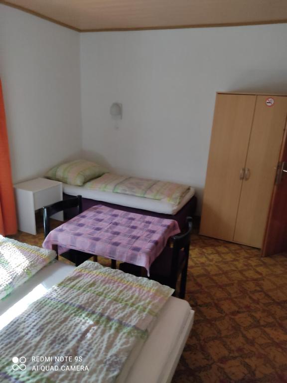 Postel nebo postele na pokoji v ubytování Sobe GRAJSKA