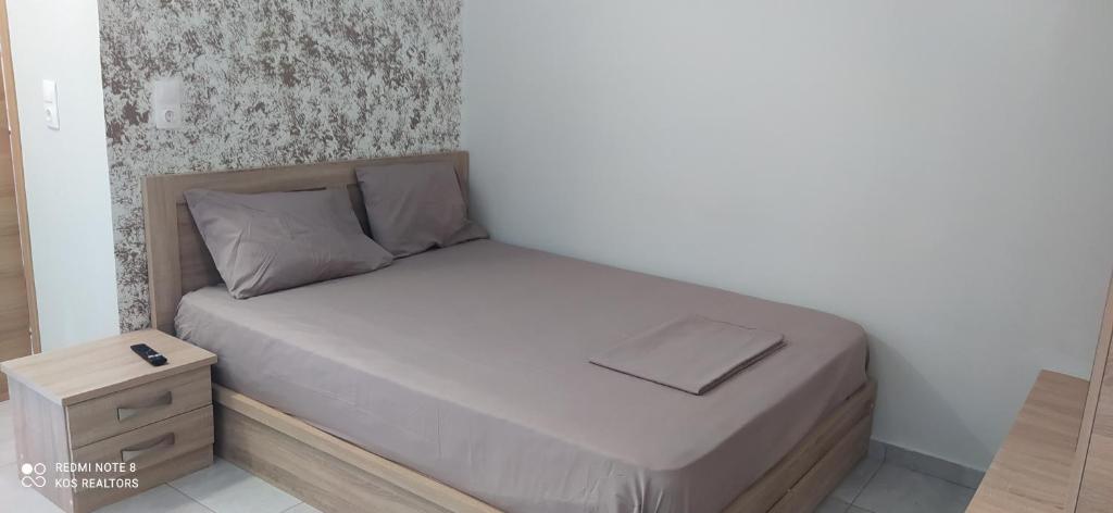 Postel nebo postele na pokoji v ubytování Old Town Harmony Apt