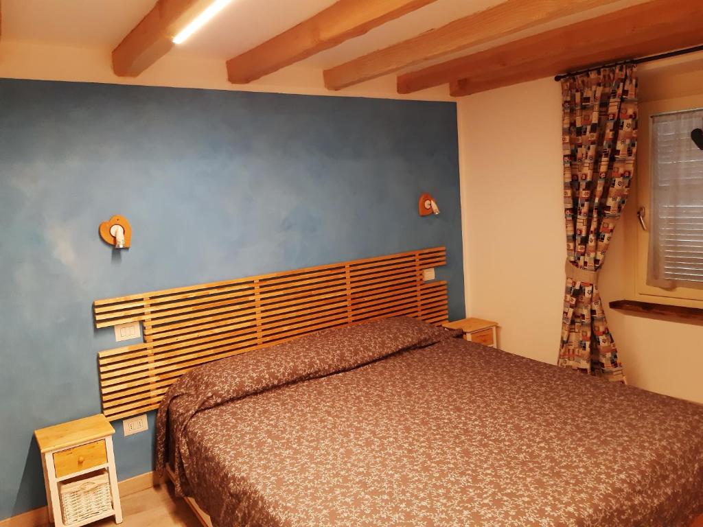 Postel nebo postele na pokoji v ubytování Appartamento con terrazza - Aymavilles