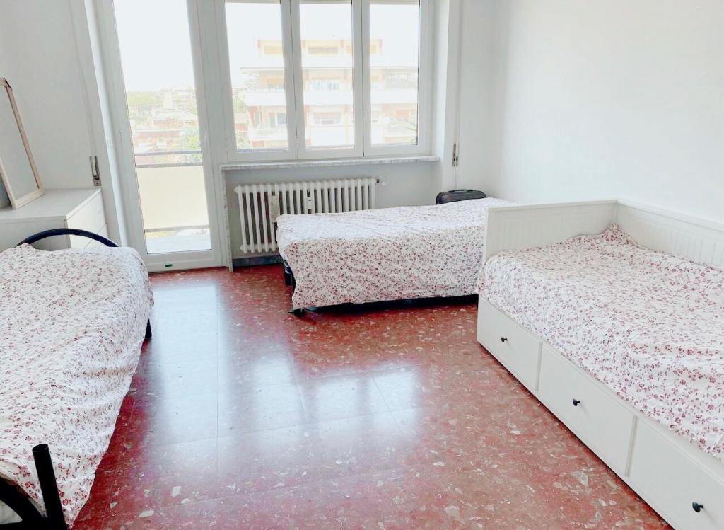 A bed or beds in a room at Female dormitory for only Female