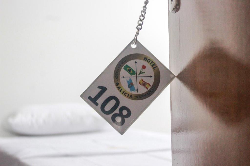 Postel nebo postele na pokoji v ubytování Hotel Galícia