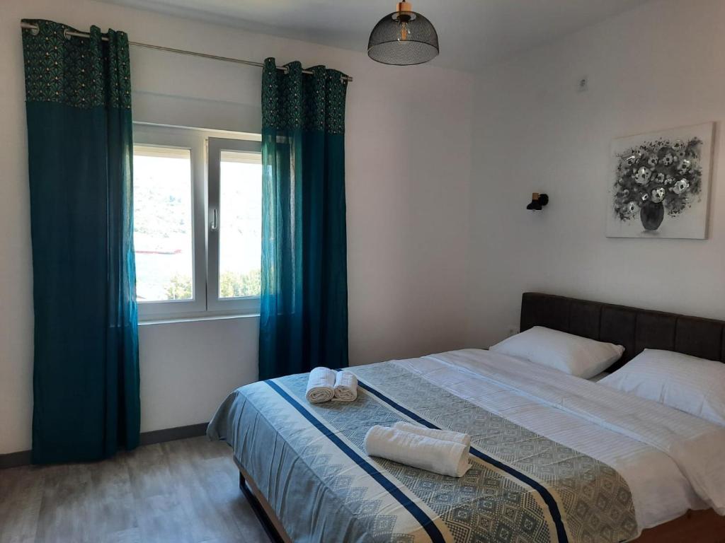 Postel nebo postele na pokoji v ubytování Seaside Village