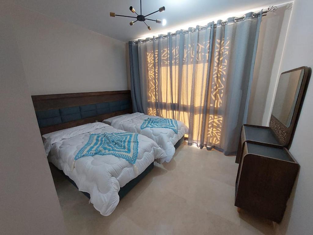 Postel nebo postele na pokoji v ubytování MCJ Luxury 2 Bedrooms Apartment