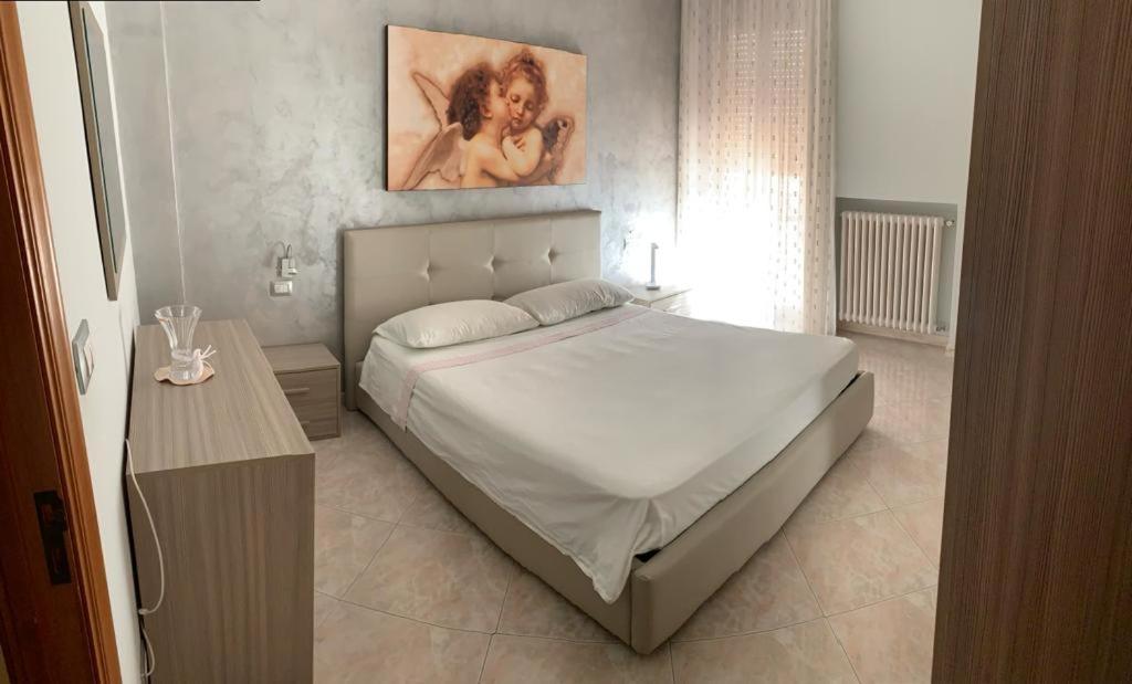 En eller flere senge i et værelse på Bilocale, via Udine 11 R, Gallipoli, Amiciziaweb