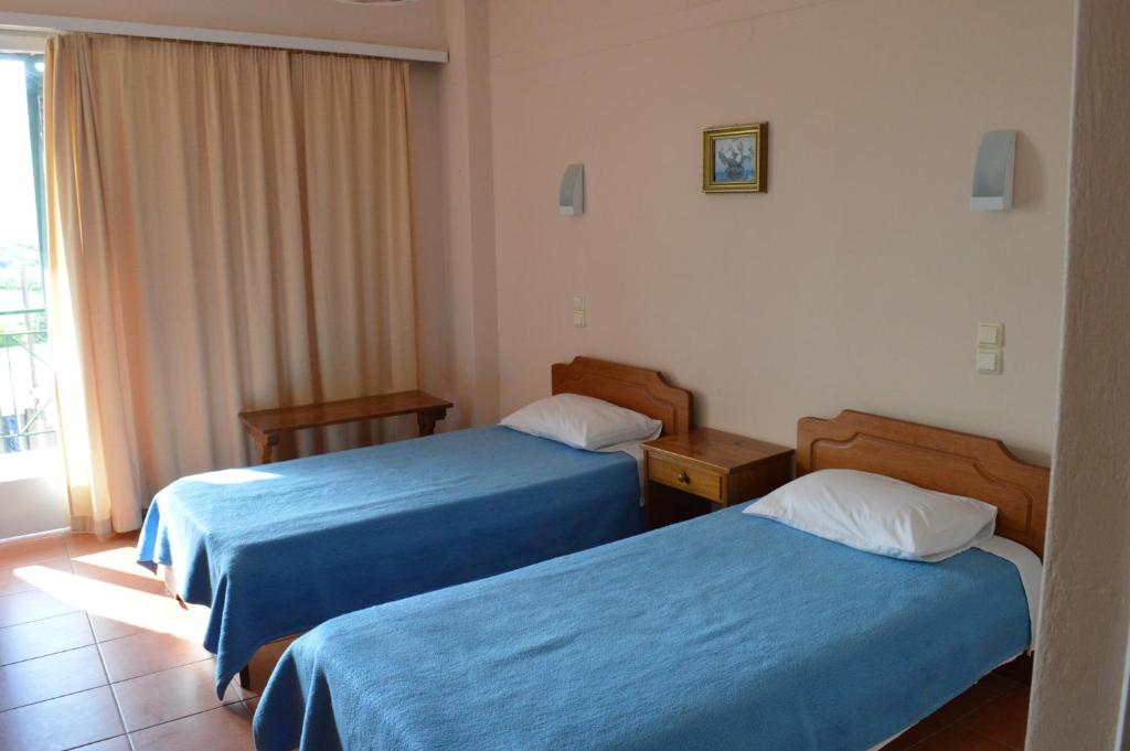 Postel nebo postele na pokoji v ubytování Klitemnistra Rooms