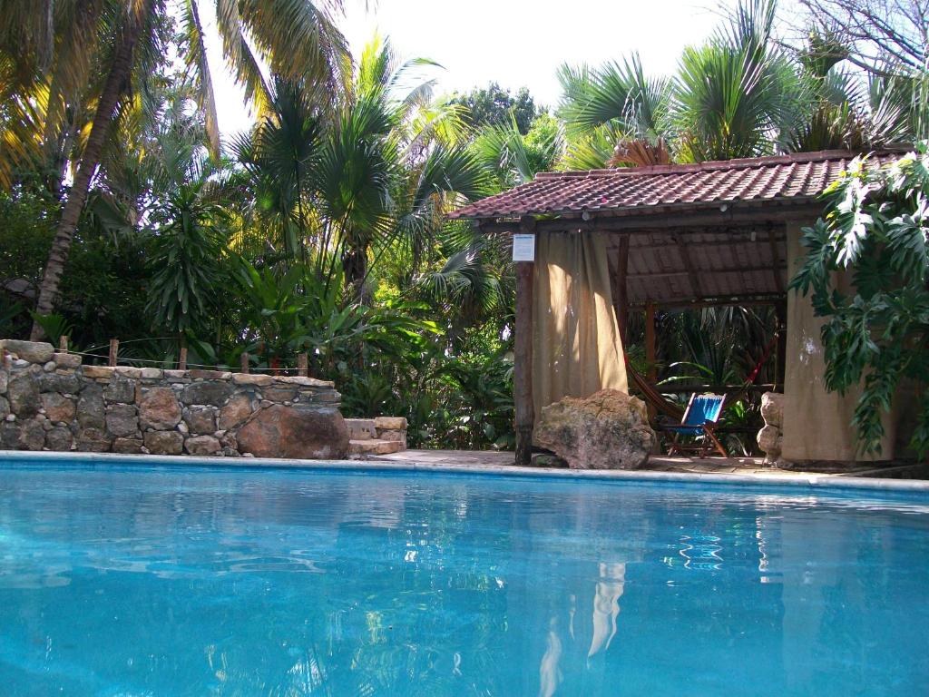 Bazén v ubytování Posada El Jardin nebo v jeho okolí
