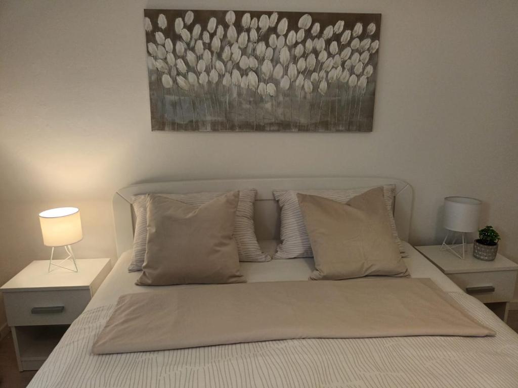 Кровать или кровати в номере Apartment & Rooms Riva
