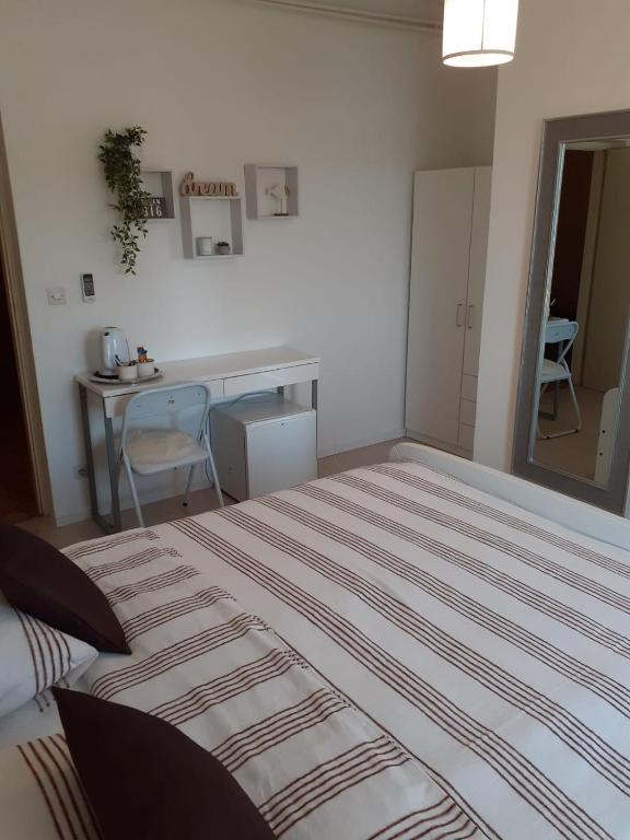 Кровать или кровати в номере Apartment & Rooms Riva