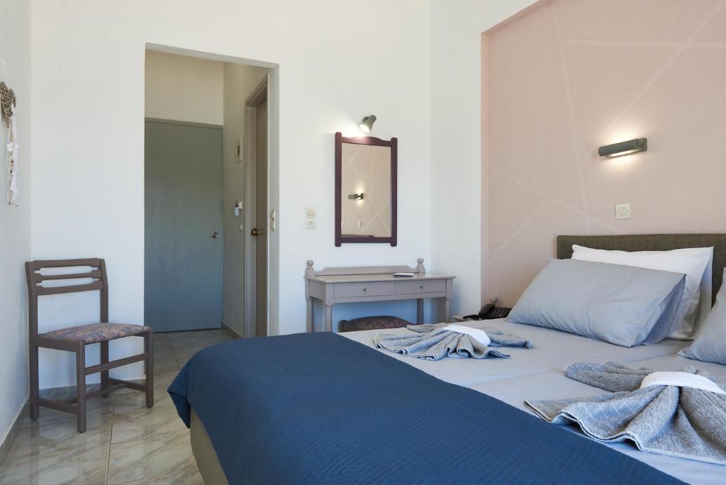Postel nebo postele na pokoji v ubytování HOTEL ATHINA
