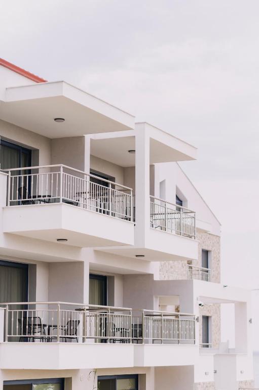 Balkón nebo terasa v ubytování BLUE STONE Luxury Suites