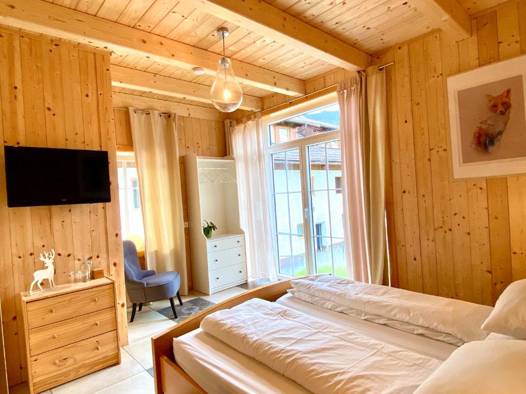 TV a/nebo společenská místnost v ubytování Haus 26 Weißbriach