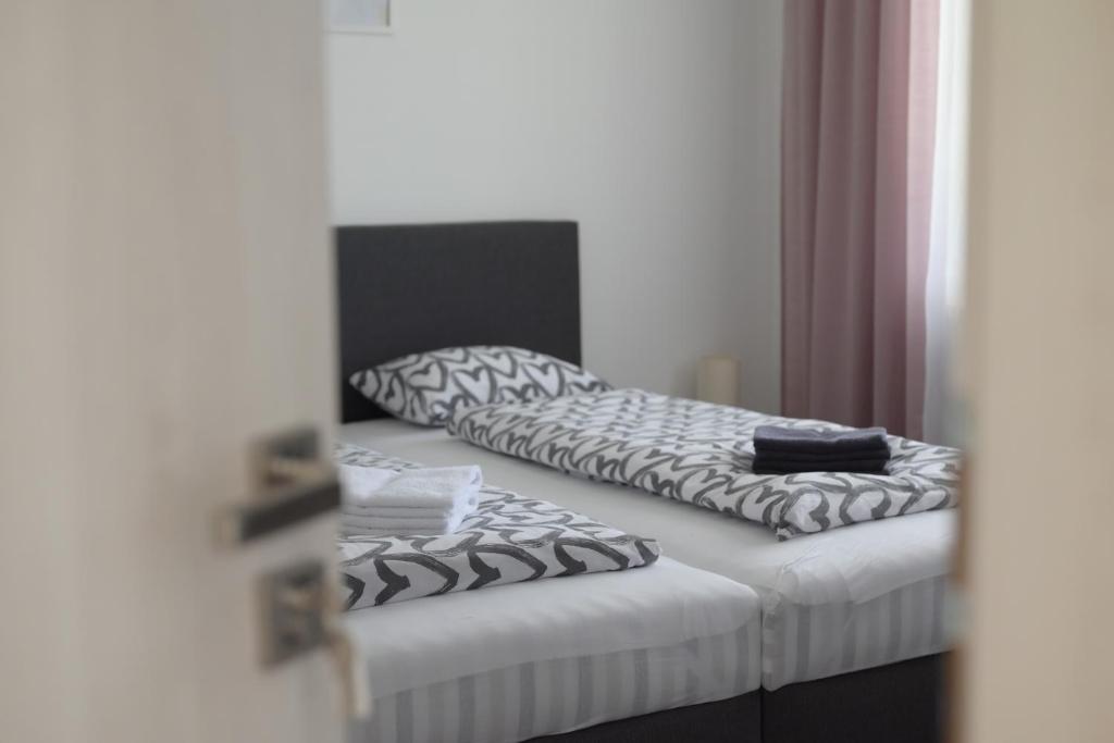 Łóżko lub łóżka w pokoju w obiekcie apartmán U Rané BOBULE