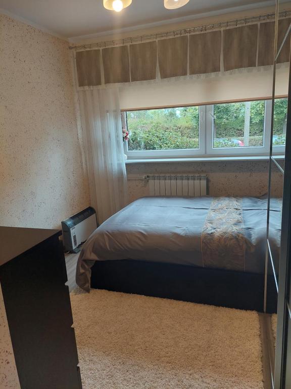 Postel nebo postele na pokoji v ubytování Christiana Andersena - apartamenty
