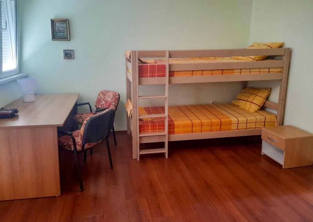 Postel nebo postele na pokoji v ubytování Villa Rossa
