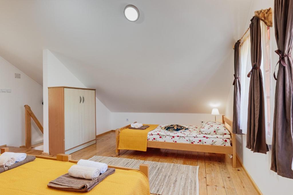 Postel nebo postele na pokoji v ubytování guesthouse LIPA