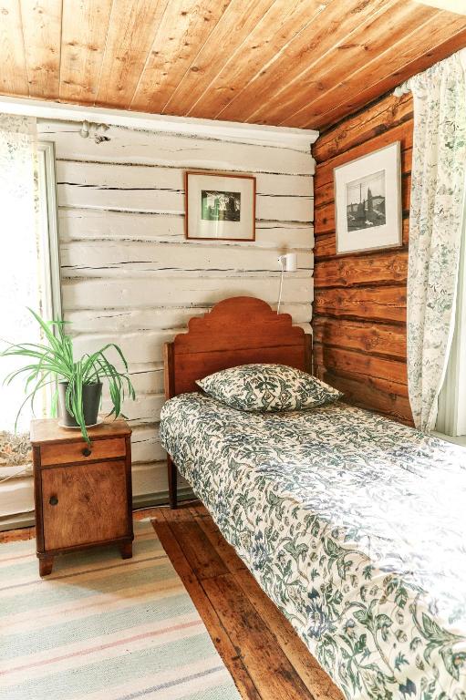 Postel nebo postele na pokoji v ubytování Matsi cottage