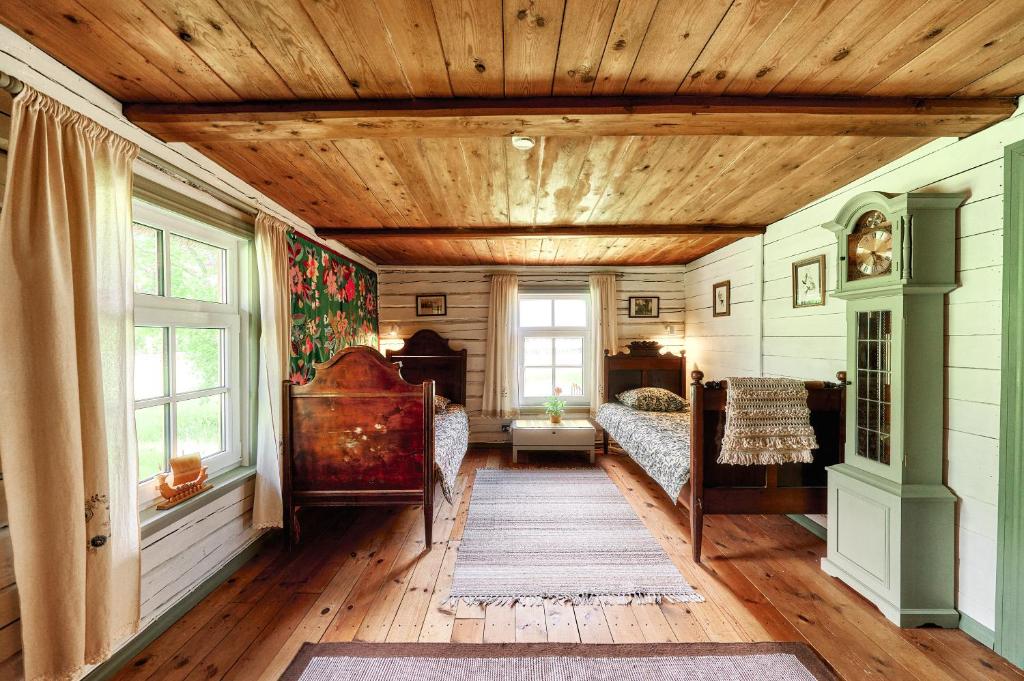 Postel nebo postele na pokoji v ubytování Matsi cottage