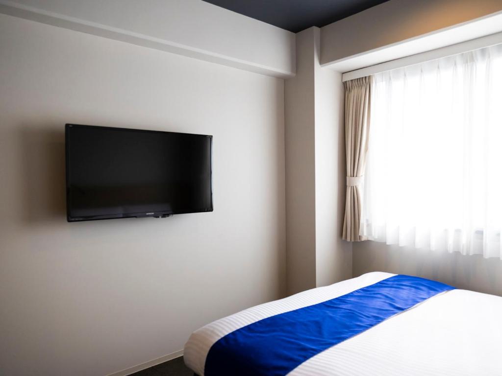 TV a/nebo společenská místnost v ubytování Ariston Hotel Kyoto Jujo
