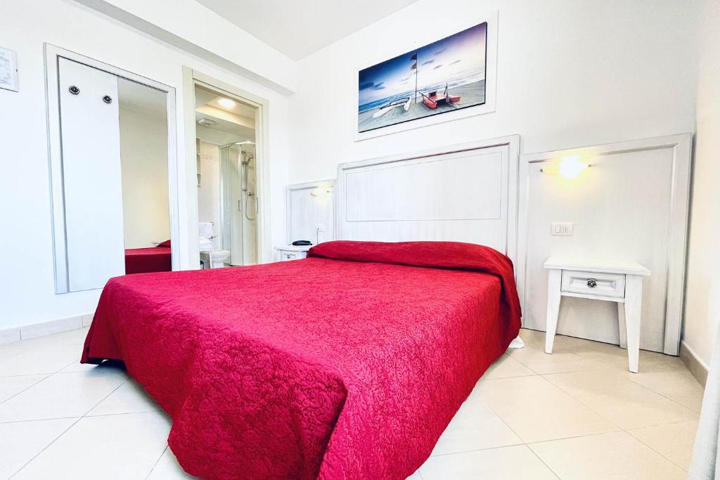Postel nebo postele na pokoji v ubytování HOTEL PIGALLE