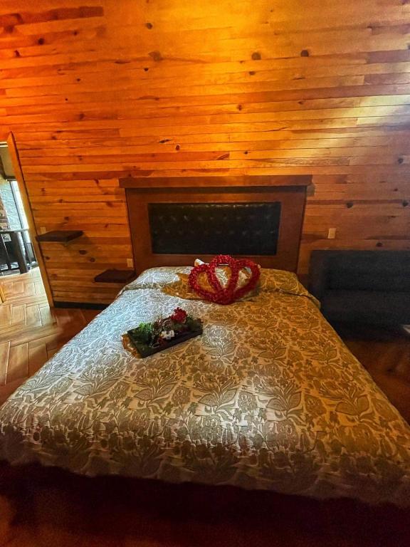 Postel nebo postele na pokoji v ubytování Cabaña Bagheera