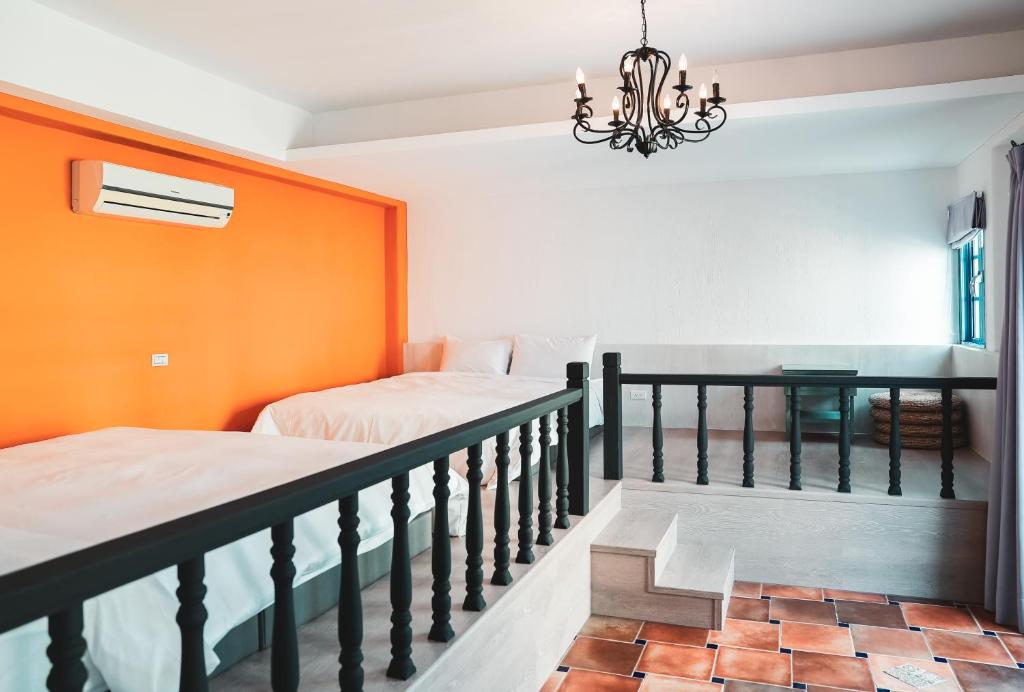 Rúm í herbergi á Bethlehem B&B Kenting