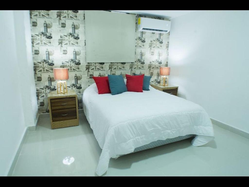 Postel nebo postele na pokoji v ubytování Malecon Cozy - Premium Plus 21