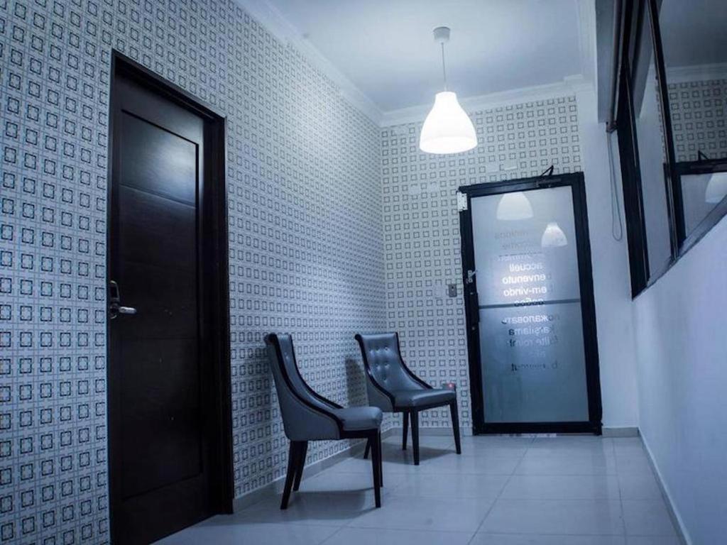 Posezení v ubytování Room in Condo - Malecon Cozy - Premium Plus 12