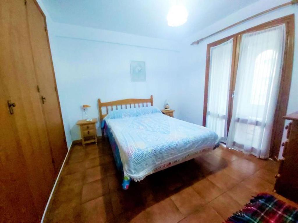 A bed or beds in a room at Central apartment Calpe