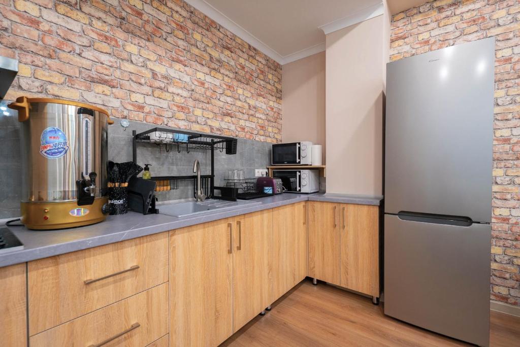 Kuchyň nebo kuchyňský kout v ubytování Kaganat Hostel
