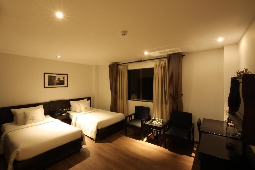 Phòng Premier 2 Giường Đơn có minibar miễn phí