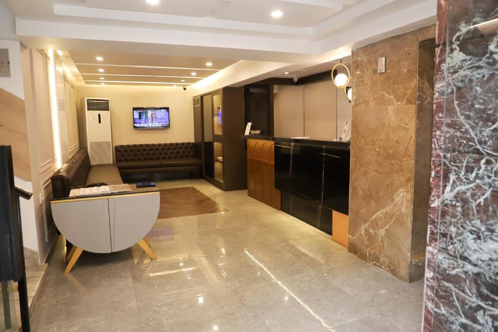 TV a/nebo společenská místnost v ubytování Roland Hotel