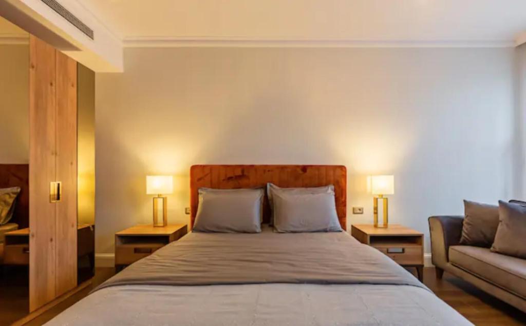 Postel nebo postele na pokoji v ubytování Istanbul Taksim 360 Luxury Apartment