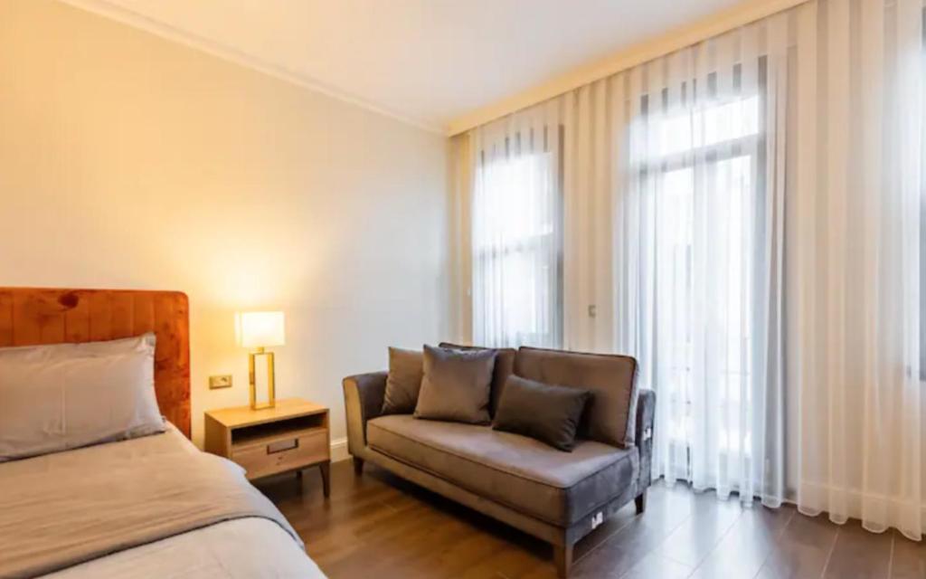Postel nebo postele na pokoji v ubytování Istanbul Taksim 360 Luxury Apartment