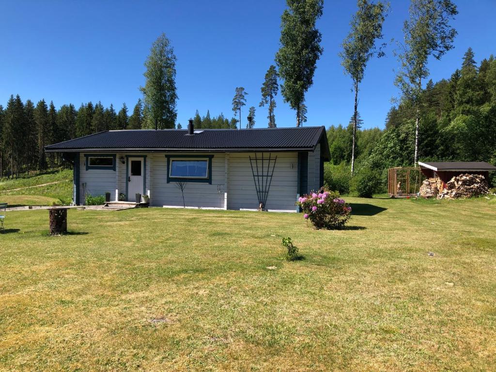 Mysig timmerstuga med braskamin nära Hovfjället - Two-Bedroom Villa